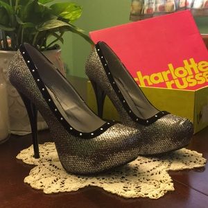 Silver sparkle platform heels with black accent
